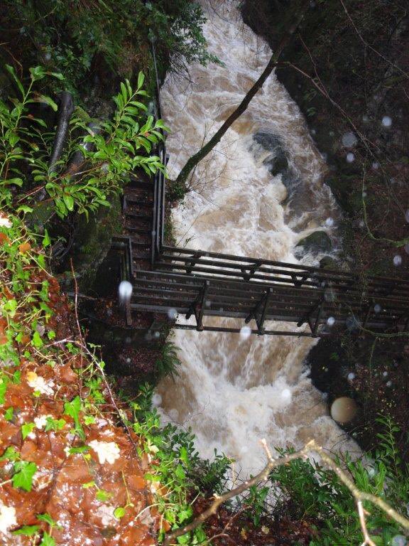 RumblingBridge's tweet photo. The river is raging with all the rain we've been having but progress hasn't been delayed too much https://t.co/6QdYJybrnv
