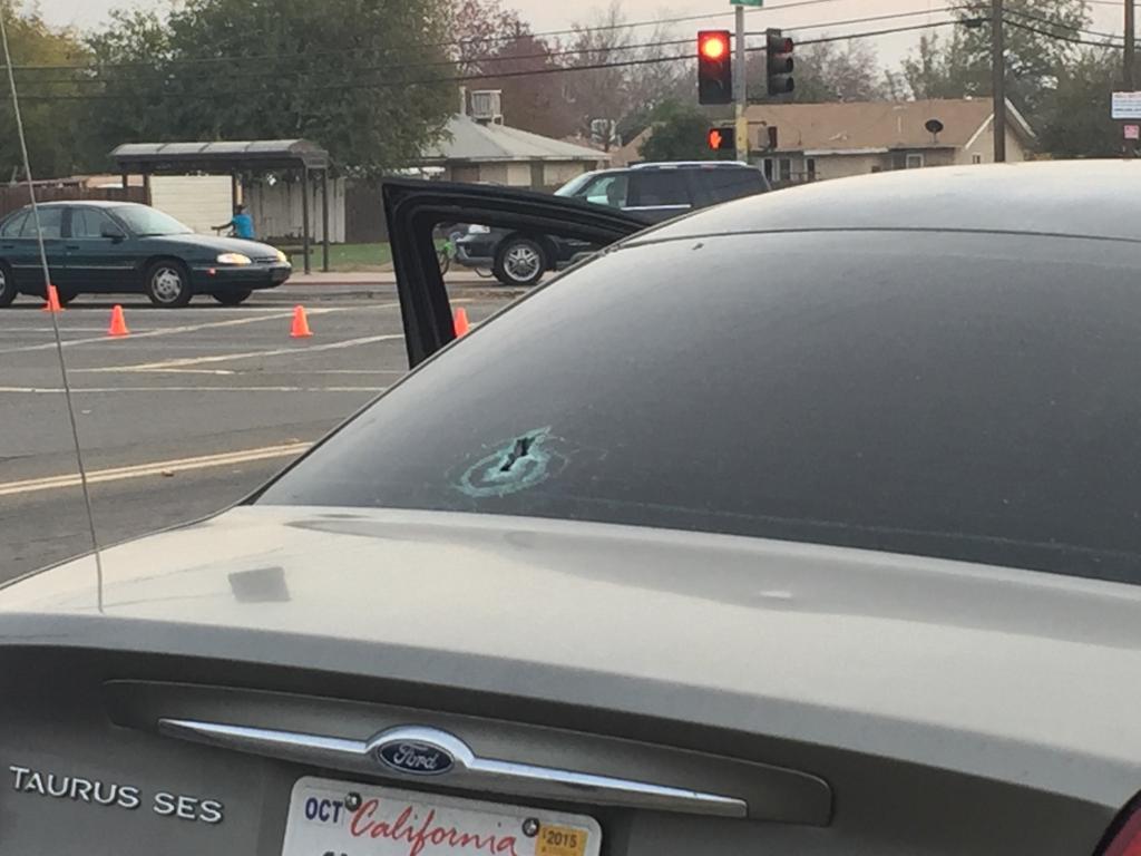 KMPHFOX26's tweet image. #Breaking Fresno Police Dept. Detective shot at while in undercover car. Back window hit, Officer ok. #LiveOnFox26