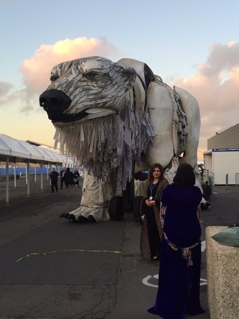 UNFCCC's tweet photo. A very cool @Greenpeace polar bear at #COP21 - and it roars! https://t.co/6ZFBAETKO8