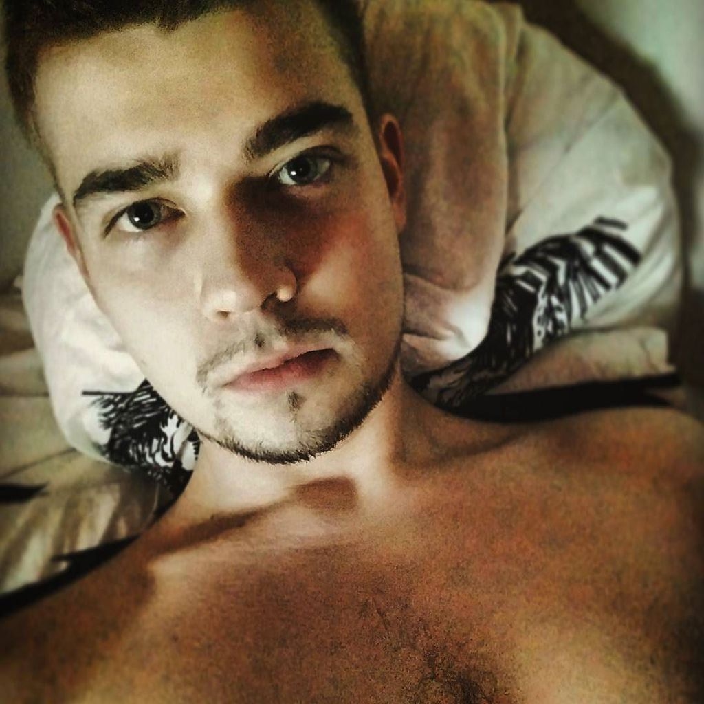 hot guy selfie in bed