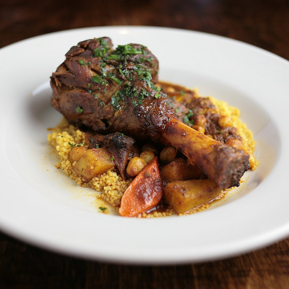 RinataMpls's tweet photo. Braised lamb shank over vegetable couscous in a light tomato sauce. #yum #RinataMpls #Uptown https://t.co/O2ELOCSEgJ