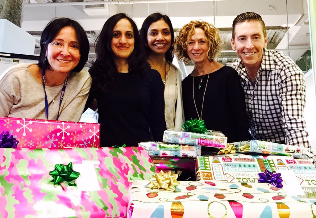 The WebMD medical team wraps presents for local children. What a blessing to be able to help.
