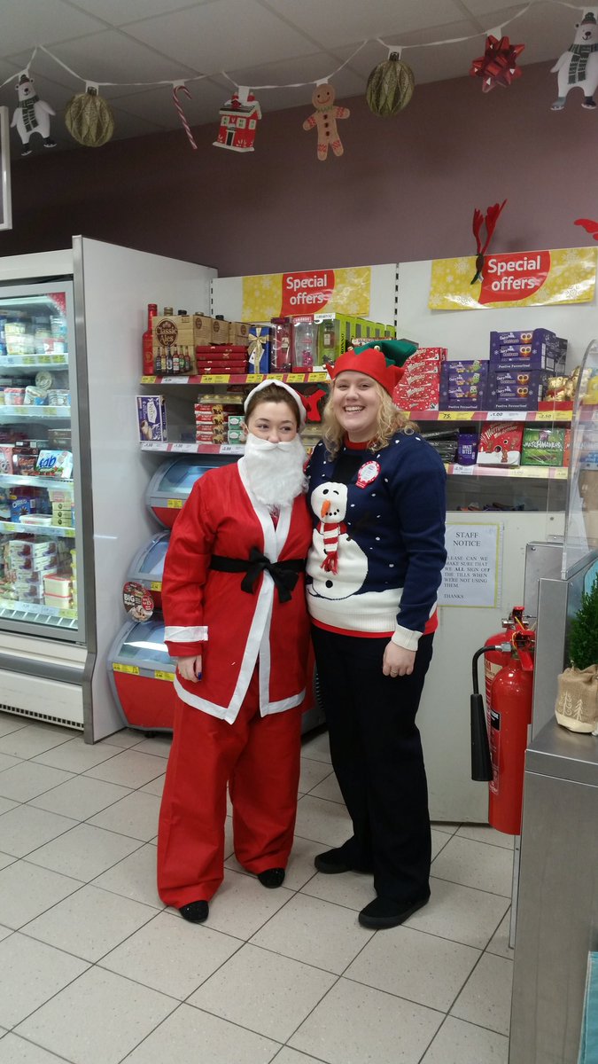 Santa and her helper have come to town....