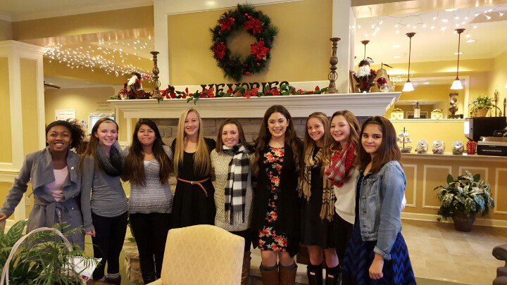 YMS 8th grade girls basketball team preparing for some Christmas caroling at a local assisted living center.