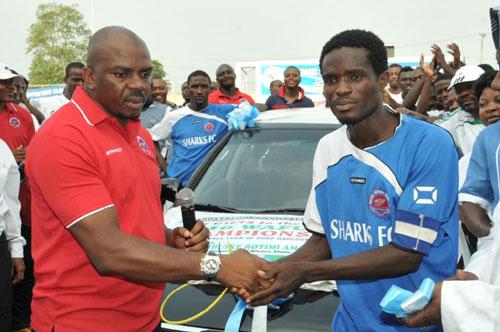 Hon. Boma Iyaye presenting car gifts 2 d team following our WAFU cup victory four years ago.