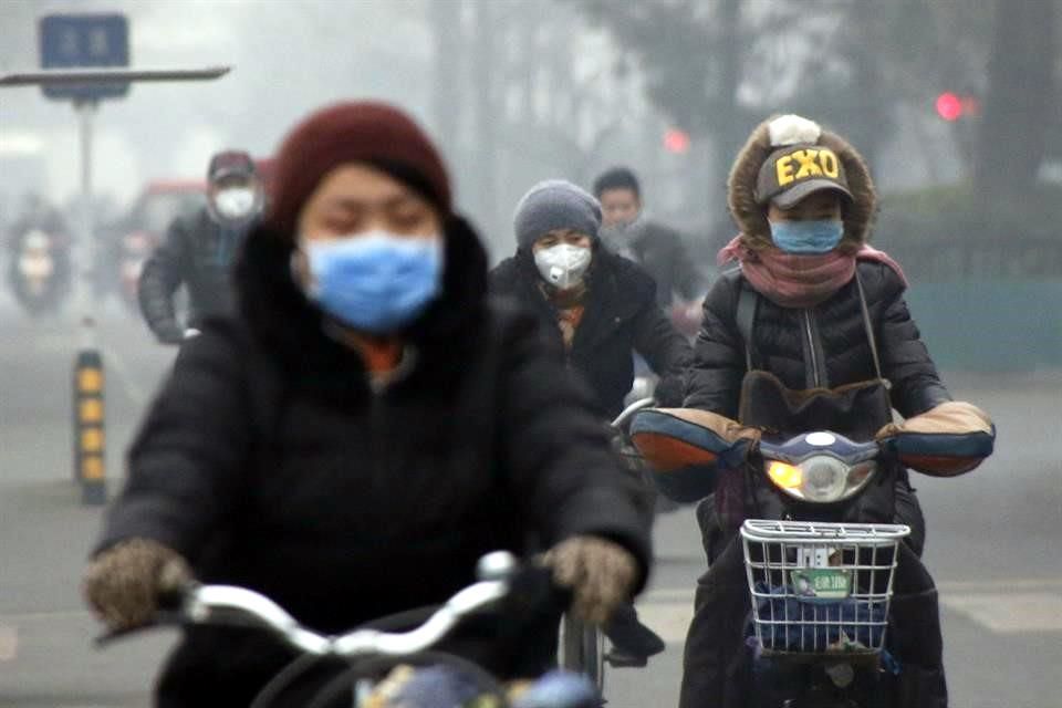 muralcom's tweet photo. Emiten alerta roja en el norte de China por contaminación.  https://t.co/w7enkB4ziR https://t.co/xNJMWxy1Vx