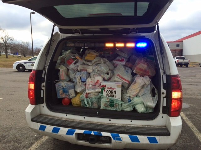 RCMPNS's tweet photo. Nova Scotians 'Stuff the Cruiser' with 600 boxes of food donations https://t.co/ZiVFErpxx7 #RCMPNS https://t.co/rViYT0rgow