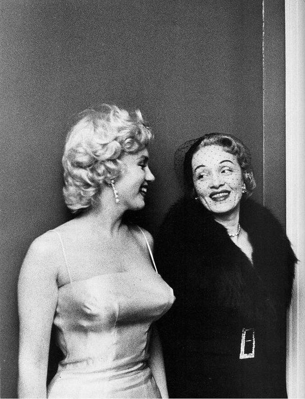 HistoryInPics's tweet photo. Marilyn Monroe &amp; Marlene Dietrich, 1955. Photograph by Milton Greene. https://t.co/DrTabZBWnX
