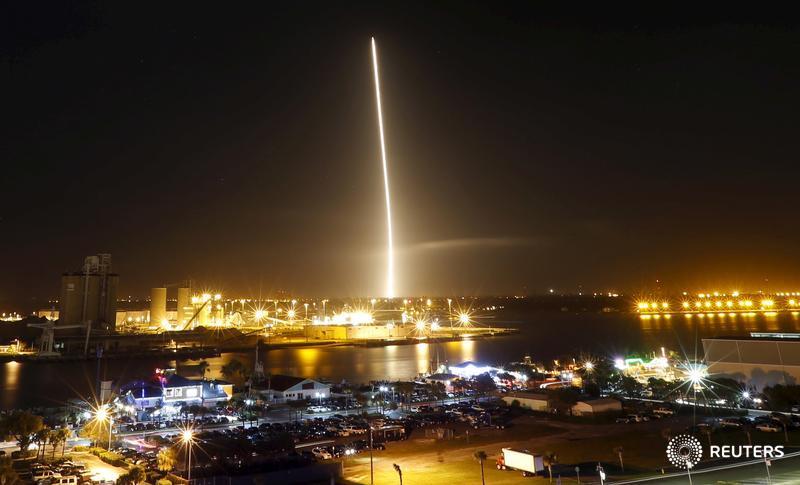 Reuters's tweet photo. PHOTOS: This is how the SpaceX Falcon 9 rocket nailed its landing in a spaceflight first. https://t.co/Hxf7dwklsN