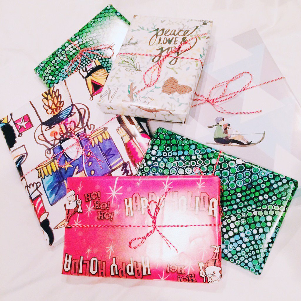 the whole fam's books got wrapped in <a href="/curbsideokc/">Curbside Chronicle</a> paper ❤️ big love for okc artists &amp; Curbside's work all year round