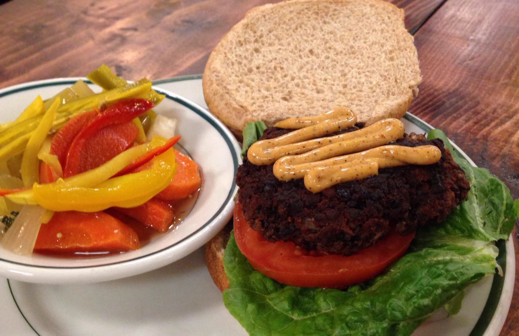 Lunch special today: Black bean burger on a whole-wheat bun with spicy aioli sauce, $5.50. #ilyceats