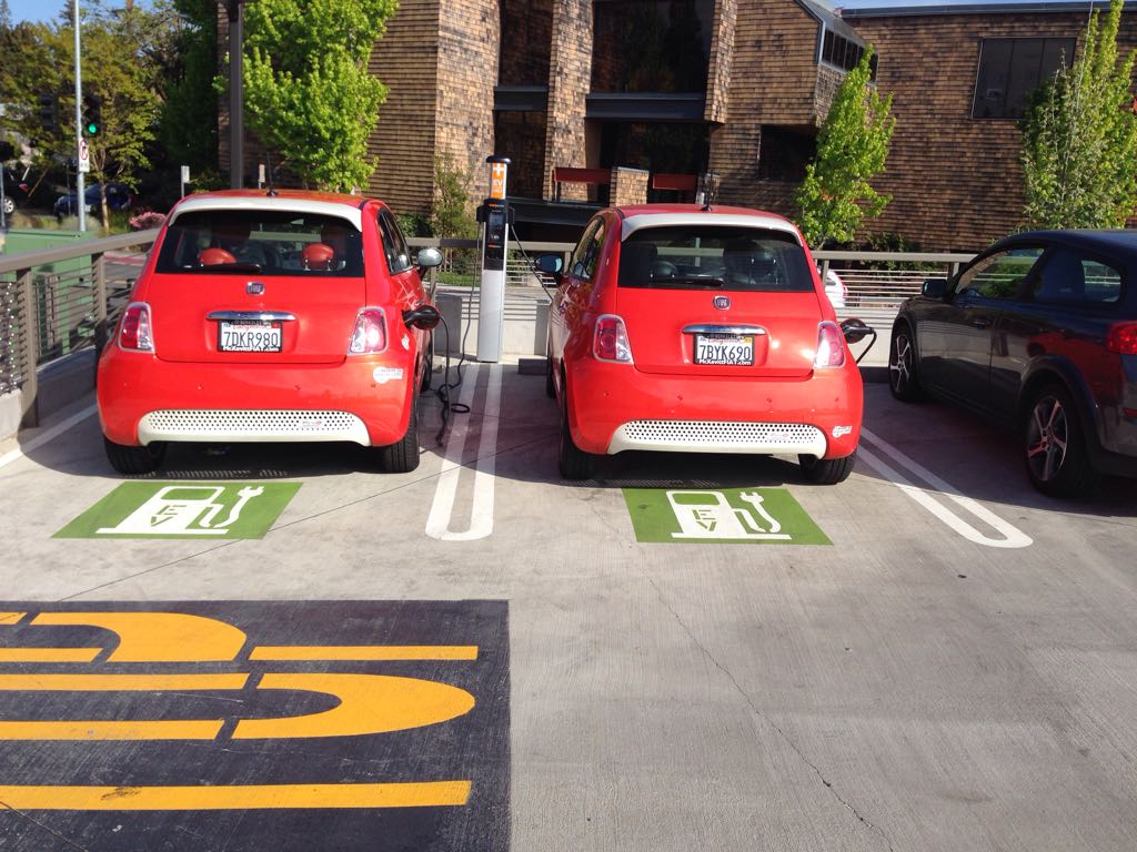 We call this one "Twinning in holiday red" Happy Holidays and safe travels! api.plugshare.com/view/location/…