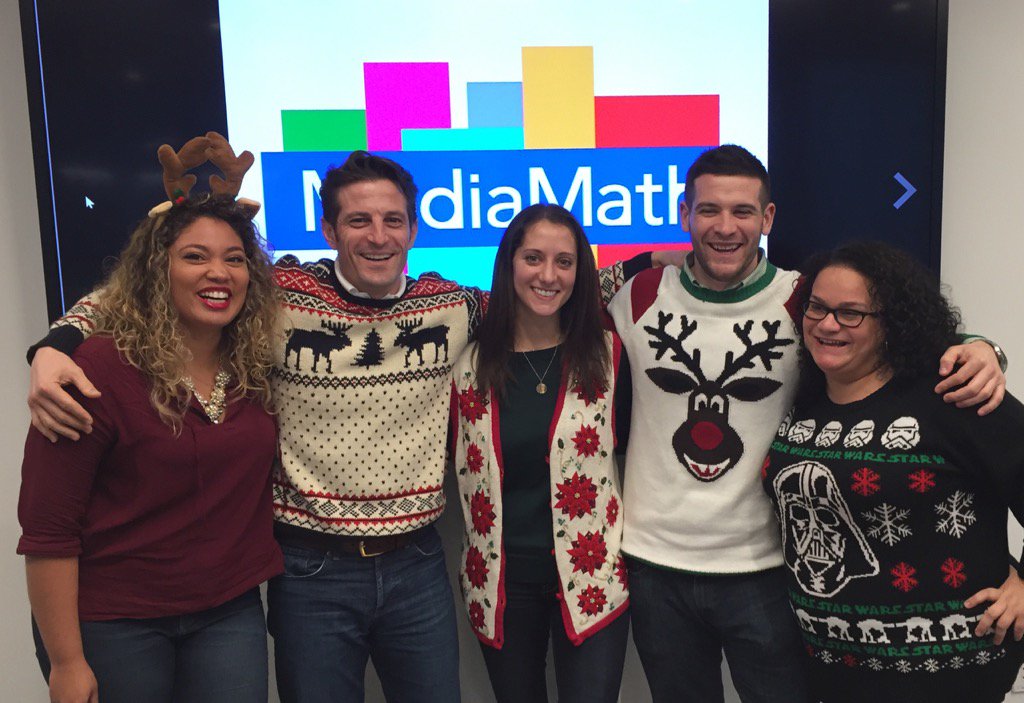 StanPique's tweet photo. Xmas sweater day @MediaMath HQ. RTB'ing at light speed for the holidays season! #adtech #4wtc #marketingOS https://t.co/zEBhoJvYz0