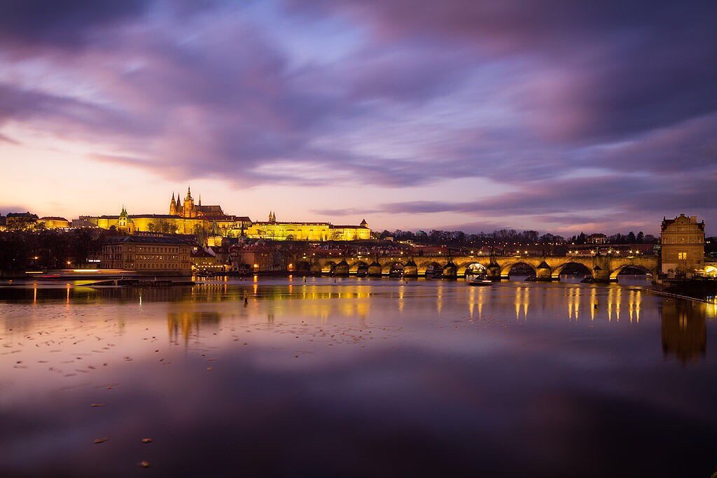 Watching Prague light up at dusk #canonwinter #prague #praguecastle #charlesbridge #twilight