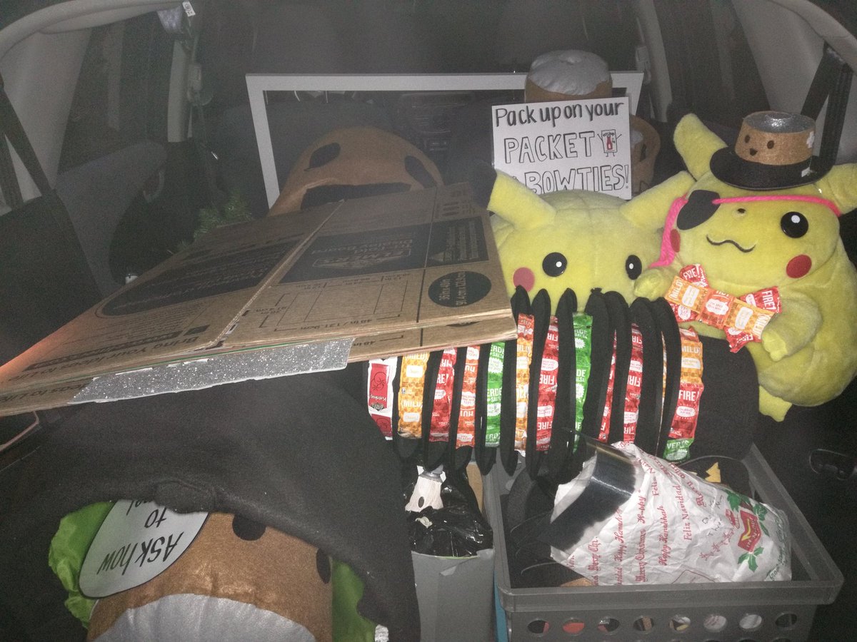 2 teams' costumes, spirit stuff, posters, plushies,  Pikachus, robots. My tiny car. Said it wouldn't fit. It did!