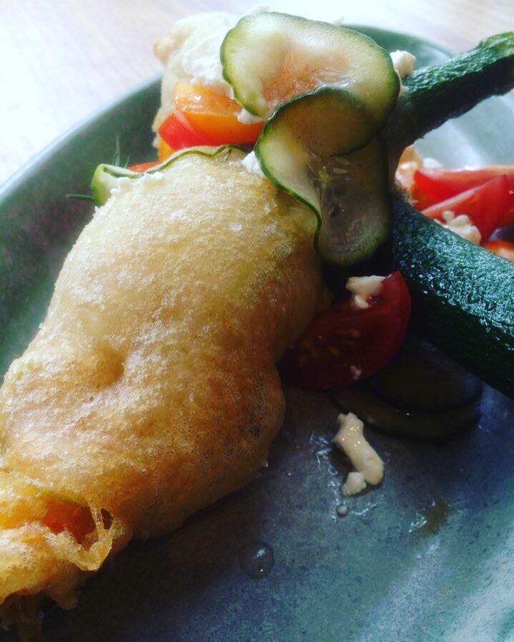 New dish on tonight. Feta stuffed zucchini flowers, dill pickled cucumber, heirloom tomatoes.