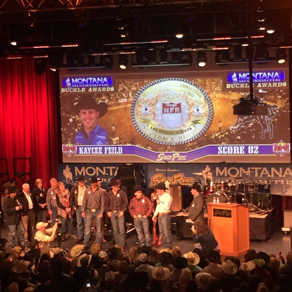 WranglerNetwork's tweet photo. #TeamWrangler's Round 9 winner Kaycee Feild accepts gold buckle with @TheWarriorTours. #LongLiveTroops #WranglerNFR https://t.co/CZGOc4LQg6