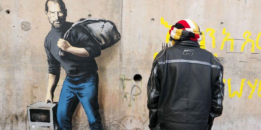 HYPEBEAST's tweet photo. Banksy's latest is a picture of Steve Jobs painted inside a Syrian refugee camp. 
https://t.co/SVWc6DZVNQ https://t.co/H2lBoKgL4d