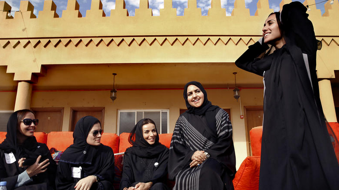 latimes's tweet photo. PHOTOS: It's a historic day in Saudi Arabia. Women are finally voting for the first time: https://t.co/eG4yISjm9A https://t.co/AjMPgP8q0o