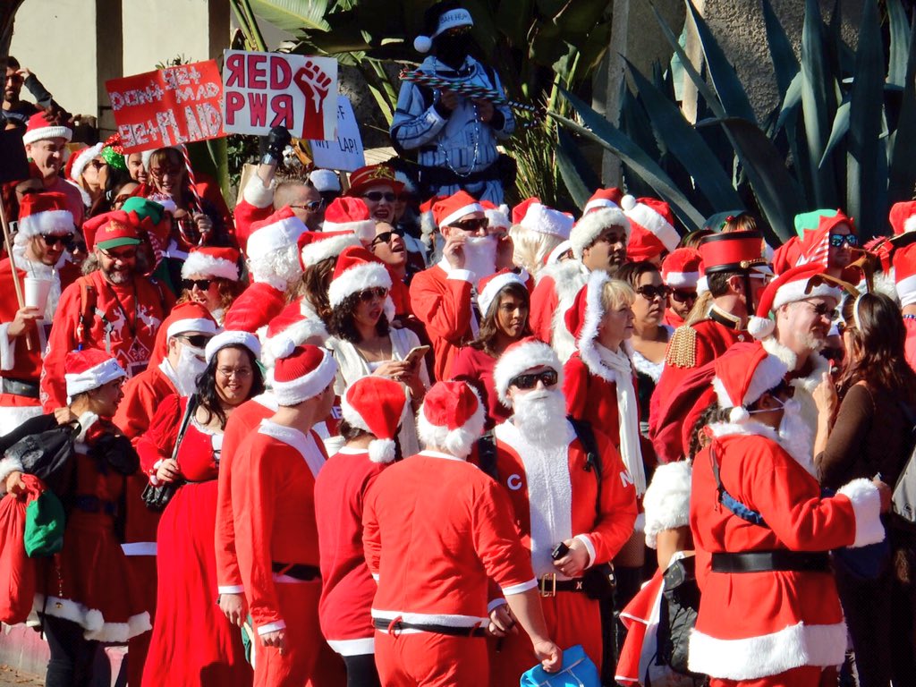 lasantacon's tweet photo. The Red Tide at the 18th Annual #LAsantacon. #santacon https://t.co/zthTafRpcX