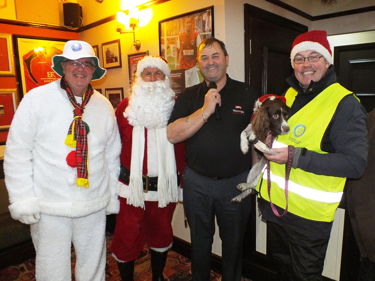 Big Benny makes the presentation to Santa, President Rick and Frosty