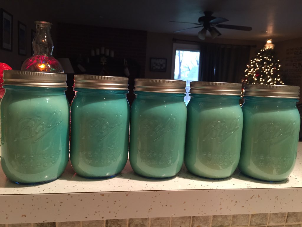 MrJamesK's tweet photo. Aged eggnog all bottled up for Christmas; blue tinted mason jars for character. Thanks for the recipe @altonbrown! https://t.co/5Bwib3vMrS