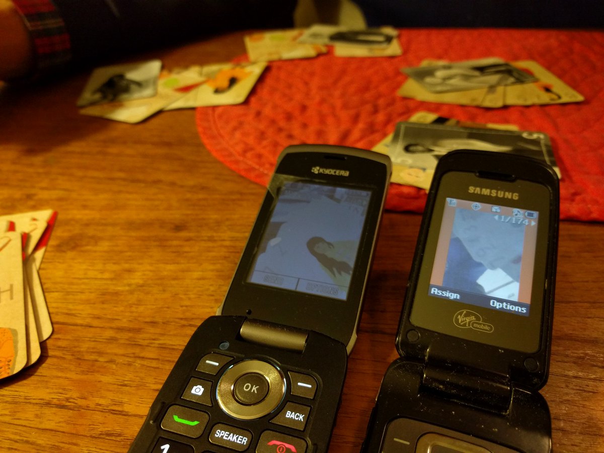 spavis's tweet photo. my surveillance photo of my dad's cards during a game of bycat.ch &amp; my parents' surveillance on their flip phones https://t.co/xM6oWDVffm