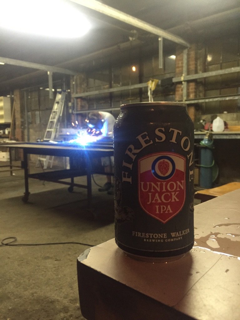 Kevin__Floyd's tweet photo. Hanging with Spencer at his new shop and drink a @FirestoneWalker https://t.co/2X7O0kgrjP