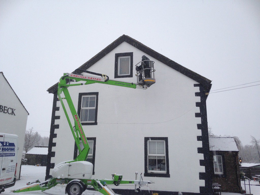 Cherry picker in the snow #roofing #Cumbria