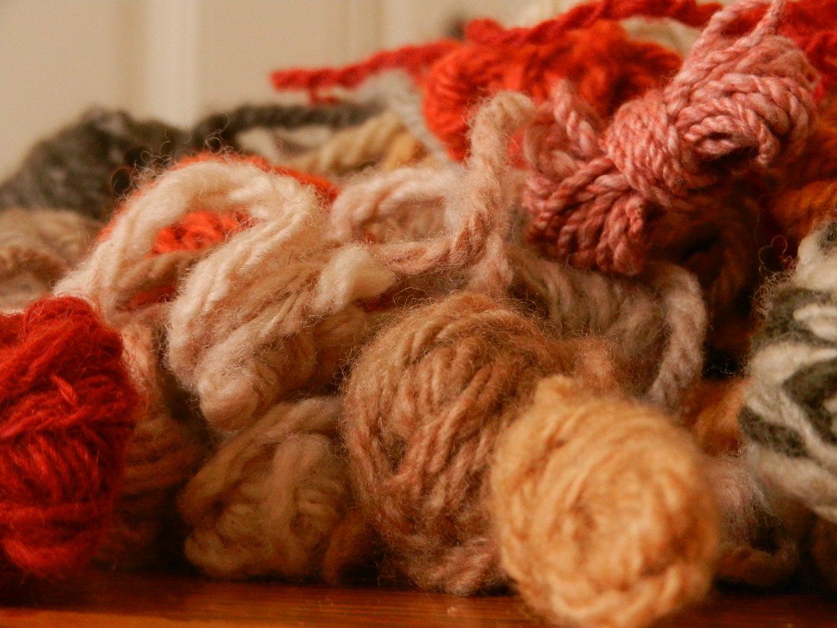 curvy_lou's tweet photo. Piles of #handdyed #handspun samples sure are pretty. #Dyed with #coffee, bougainvillea, #yellowdock, lichens. https://t.co/nh3wucscce