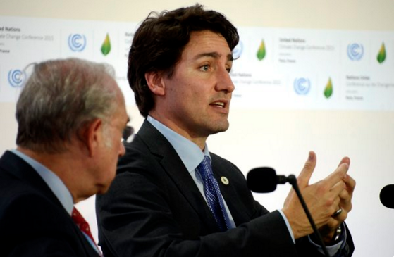 WorldBankGroup's tweet photo. .@JustinTrudeau - #CarbonPricing: "no longer a choice between what's good for the economy &amp; the environment" #COP21 https://t.co/7aB8hKSzzn