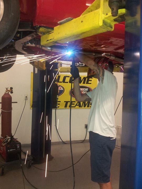 claude_hoffman's tweet photo. Troy working on Ike's exhaust. https://t.co/oIQwAxupNU