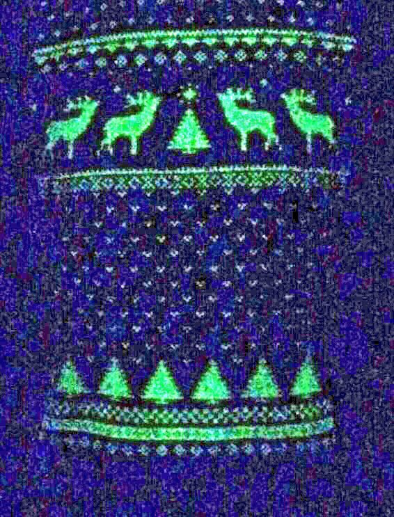 RupertMoon's tweet photo. Everyday is Xmas jumper day when you glow in the dark! 
@JollyClothing helped my face for darkness. 👍🎅
#LightsOut https://t.co/ots91jOmZU