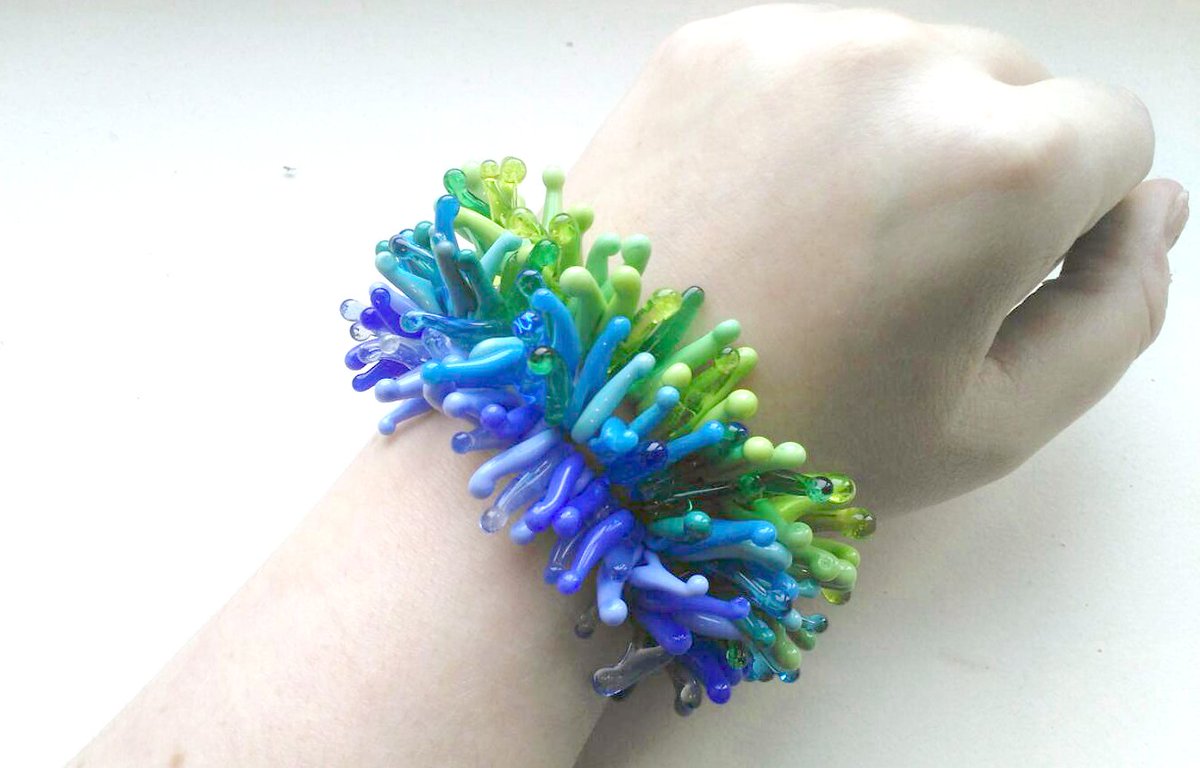 ElathaStudio's tweet photo. Elatha has gone across the pond! A lovely order of three stacking coral polyp bracelets! #handmade #glass #coral https://t.co/DFZitNBFSJ