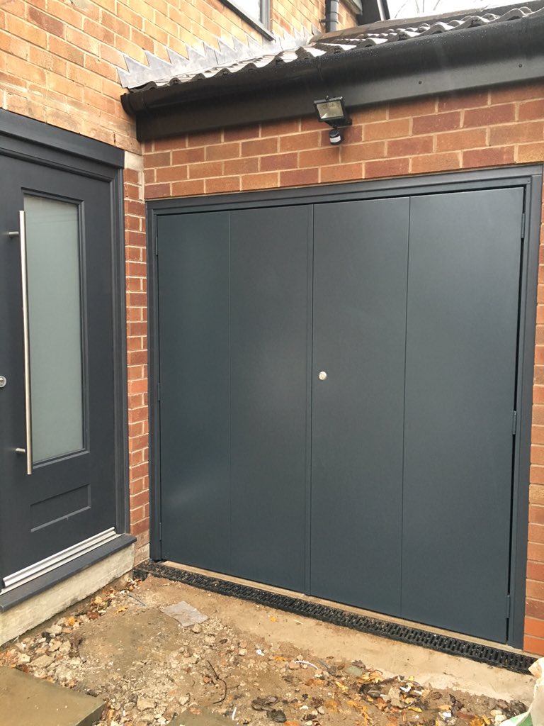 GEGarageDoors's tweet photo. #sidehinged garage door and matching #entrance door in popular anthracite finish.Been busy in the #highpeak https://t.co/2ws0OApsnK