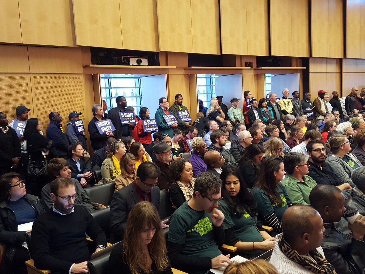 clayPDX's tweet photo. HAPPENING NOW: City hall packed in support of historic legislation that would allow #Uber drivers to unionize https://t.co/QNpPIXteEg