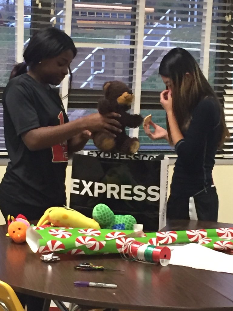 OMHS_PTSA's tweet photo. Getting into the holiday spirit! @OMHS_Eagles SADD students wrapping gifts for those in need. @DDance_BCPS https://t.co/mYis6yfttj
