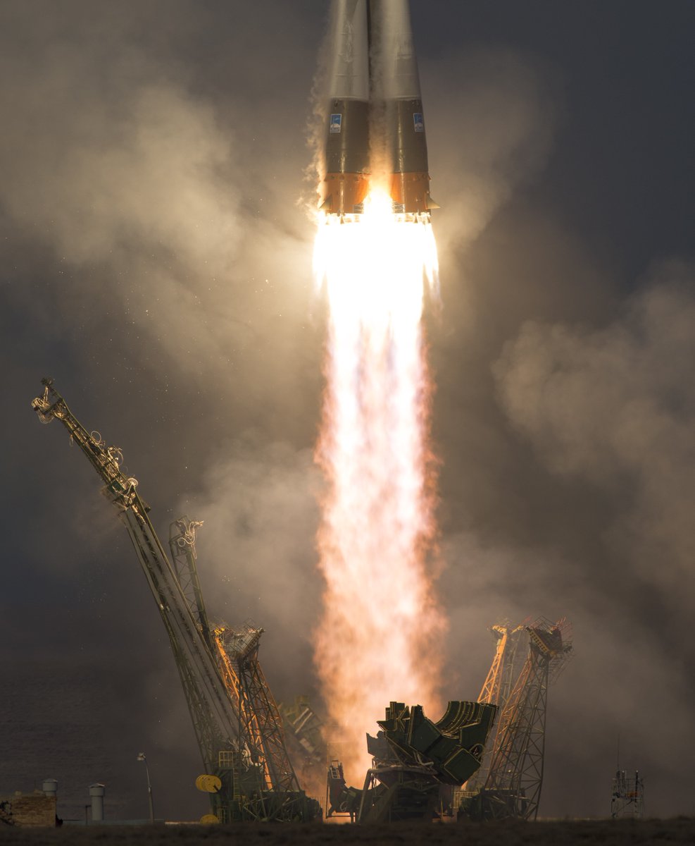 NASA's tweet photo. A beautiful look by @NASAHQPhoto of the 6:03am ET #Soyuz launch carrying three new crew members to @Space_Station https://t.co/BM6neCe0D0