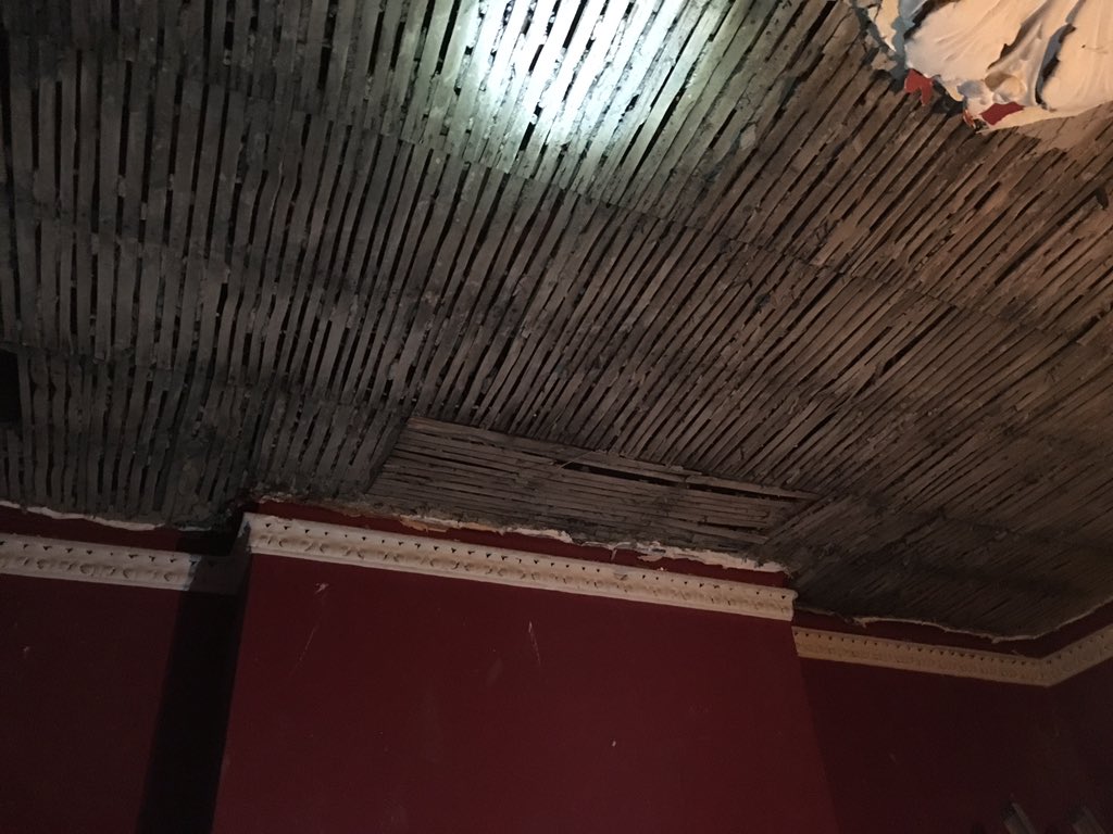 Old ceiling down, original Victorian ceiling rose still intact.