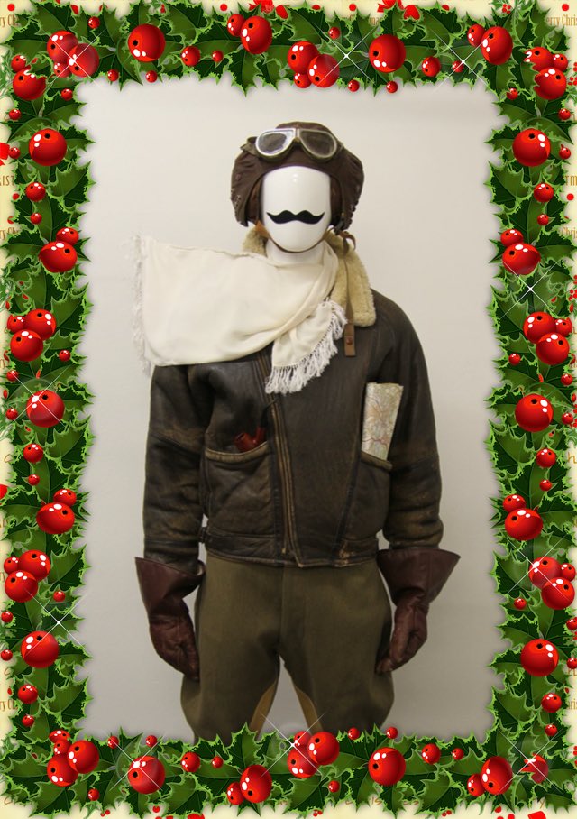 Foxtrotprod's tweet photo. Behind door 15 is our handsome pilot ready to sweep yesterday's land girl off her feet.Chocks away! #costume https://t.co/SXAsFIow0y