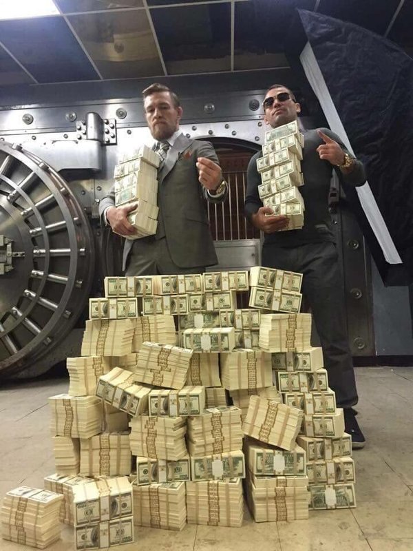 MensHumor's tweet photo. Only took Connor McGregor 13 seconds to earn all of this... https://t.co/3RHv9iApEs