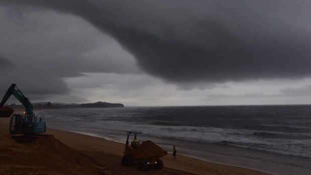 smh's tweet photo. #Update: The Bureau of Meteorology has issued a tornado warning for the Sydney area https://t.co/oCK7pfws2a https://t.co/mdcCXMYrNa