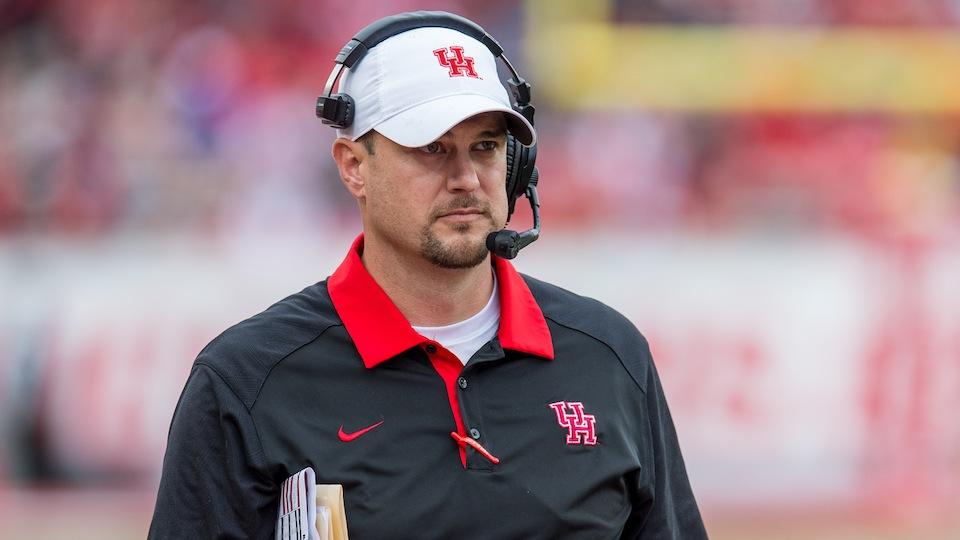SInow's tweet photo. WATCH: Houston coach Tom Herman got his grill fitted by Paul Wall https://t.co/nQEXmIZMzr https://t.co/L4zbKTXDEd