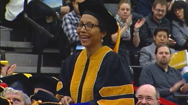 UMBC's tweet photo. Dr. H honors Michele Williams, who has created assistive tech for people w/disabilities @Toyota @Microsoft #UMBCgrad https://t.co/1zzE3NaAGg