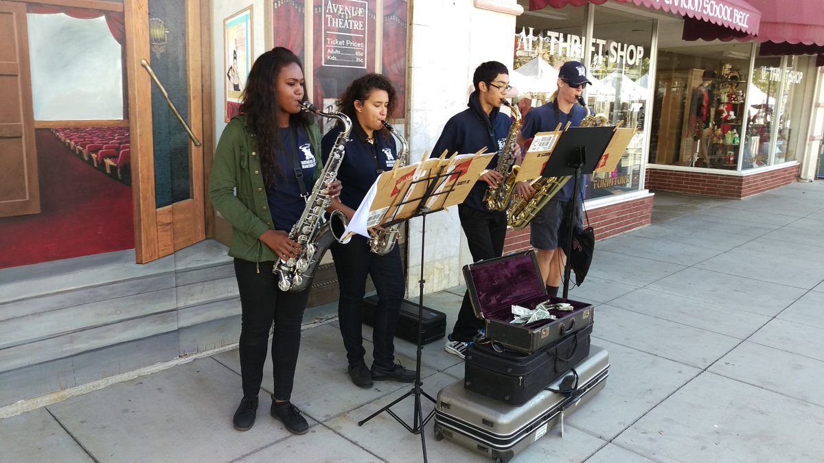 DowneyFM's tweet photo. The Downey Farmers Market Orchestra.. Performing their hit single, "Morning Sax" https://t.co/KJcJkc9HqK