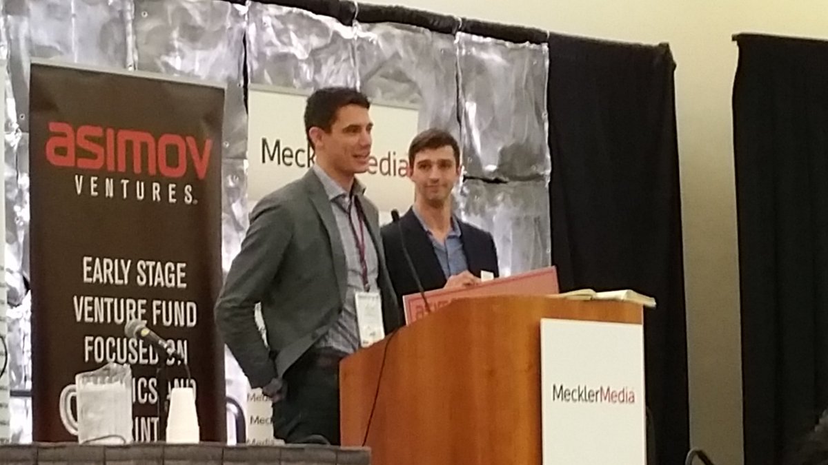 markollila's tweet image. Leo from @getcleverpet accepting award from @AsimovVentures #RoboUniverse @RoboUniverse
