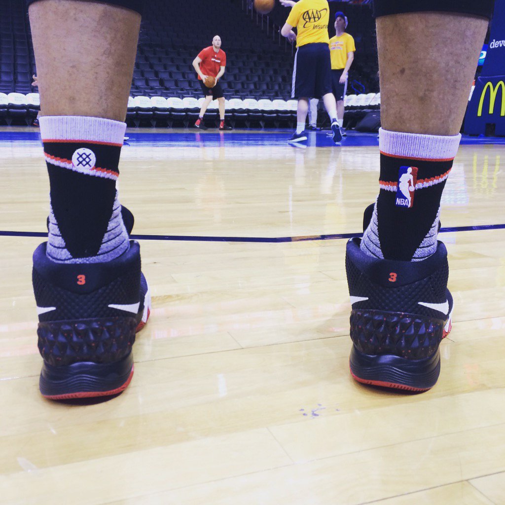 CHold's tweet image. The first wear of the black @trailblazers @stancehoops socks treating @CJMcCollum real well