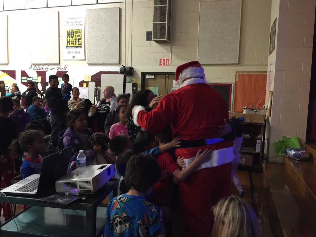 brea_awilda's tweet photo. After the movie night, Santa Claus made an early surprise visit to the students @ 12&amp;Marion.  #RSDproud @RDGschools https://t.co/uID5Iw9cOs