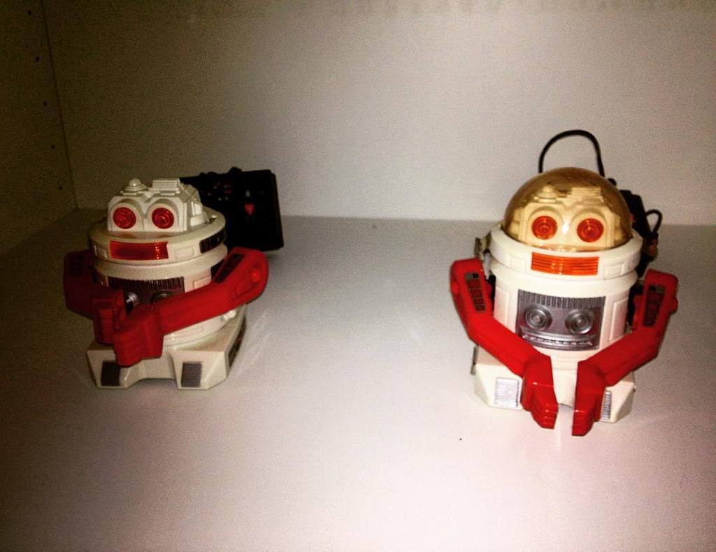 Otherbots's tweet image. Robbie #robot and his bold cousin that walks without a helmet. #retrorobots #supertoys #hongkong #1984 by brunfisk