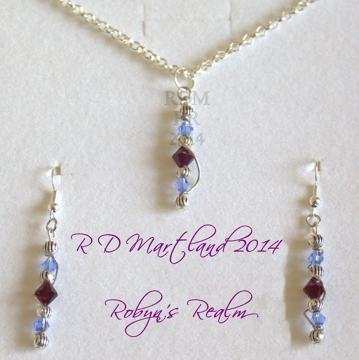 RobynsRealm's tweet photo. A #Swarovski crystal twist pendant and earring set I made.
#Blue and #Purple #CrystalBeads
#RobynsRealm https://t.co/cQXvpg2KLz